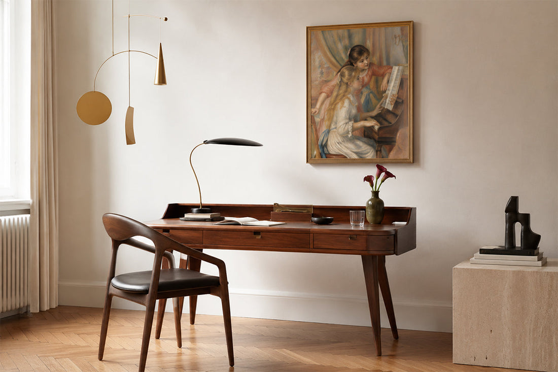 Minimalist home office with warm wood desk, herringbone floor, and Renoir-inspired wall art in soft neutral tones.